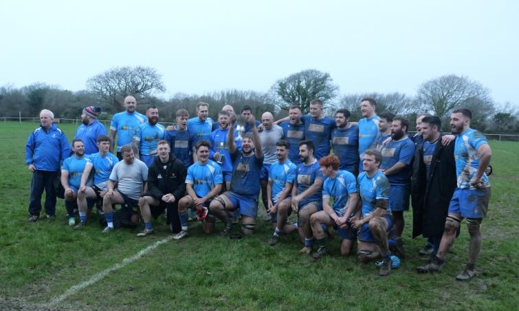 Karl Busch raises the Bishop Cup for The Blues (William John)